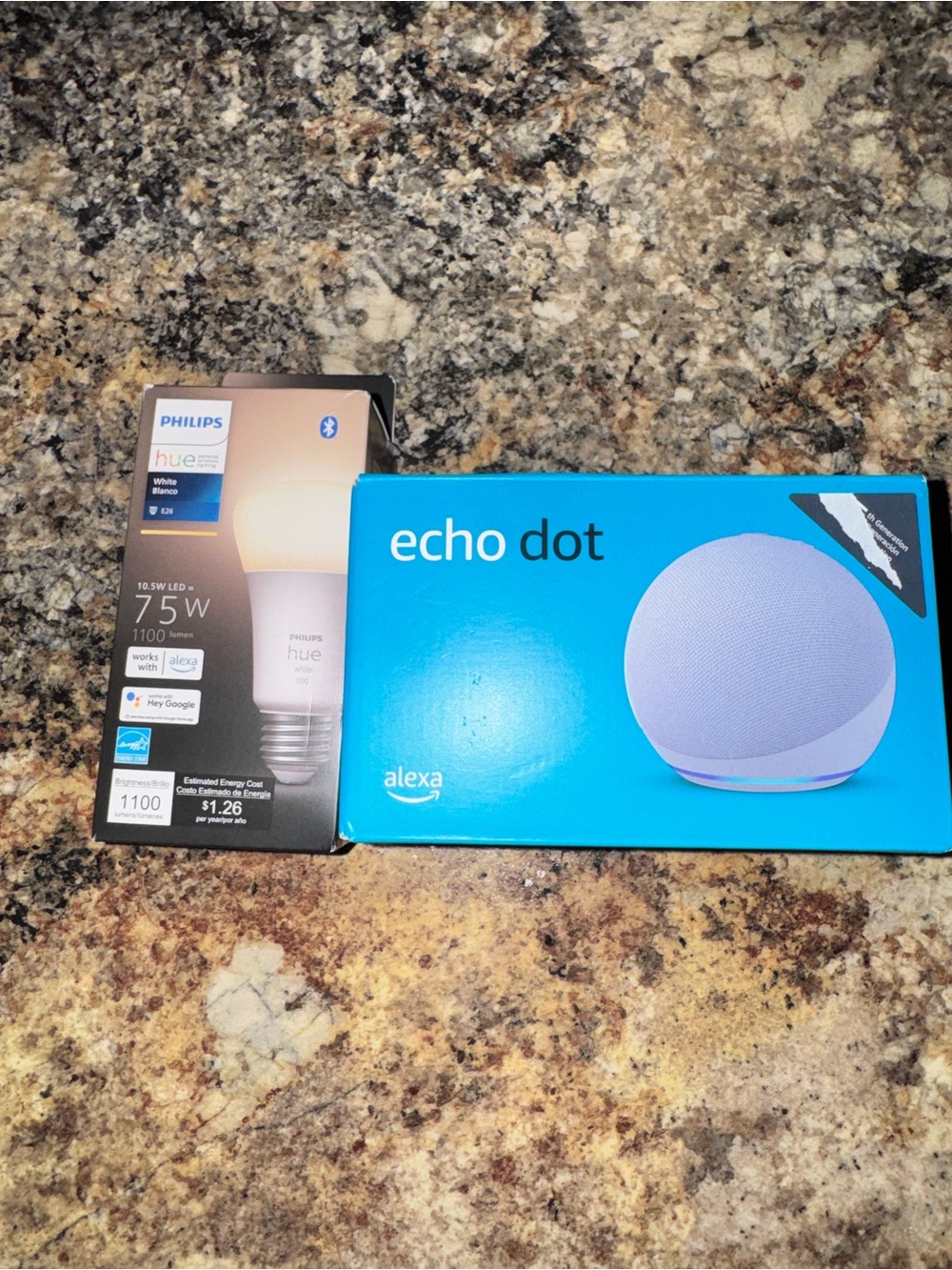 Alexa Echo Dot and Philips Hue bulb on countertop brand new